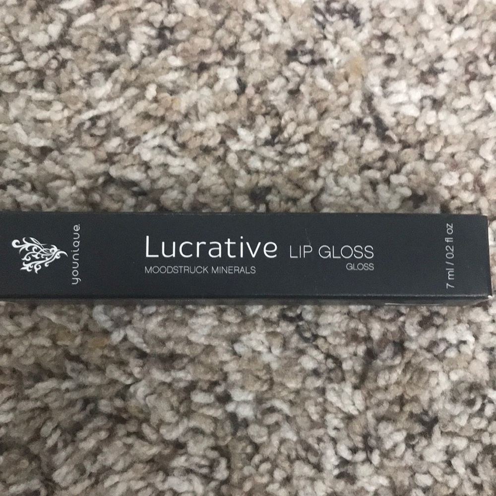 Younique lucrative lip gloss in loyal